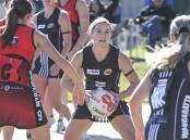 Wangaratta midcourter Leah Jenvey looks to get the pass away during the Magpies' clash against the Saints at Norm Minns Oval. Picture by Mark Jesser.