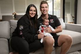 Wodonga Saints coach Zack Pleming with wife Sloan and baby Colton, 6 weeks, ahead of his 100-match milestone on the weekend. Picture by James Wiltshire