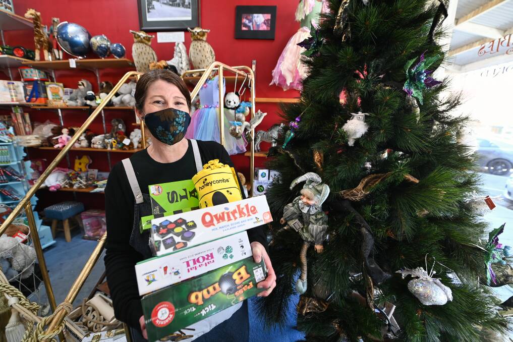 Beechworth Toys and Collectables manager Cathy Sandow is keeping optimistic about a downturn in business, even putting up her Christmas tree in the hope it will come early. Picture: MARK JESSER