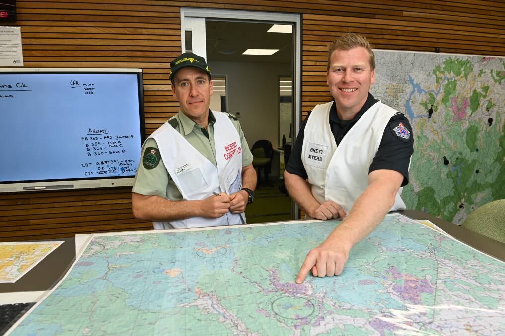 FFMVic deputy chief fire officer Aaron Kennedy with Fire Rescue Victoria's Brett Myers. Picture by Mark Jesser