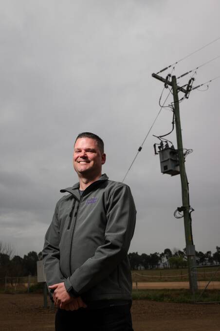 Indigo Power project manager Heath Shakespeare at the Corryong Recreation Reserve, the site of a solar power system under the The Place-Based Power Plan. Picture by James Wiltshire