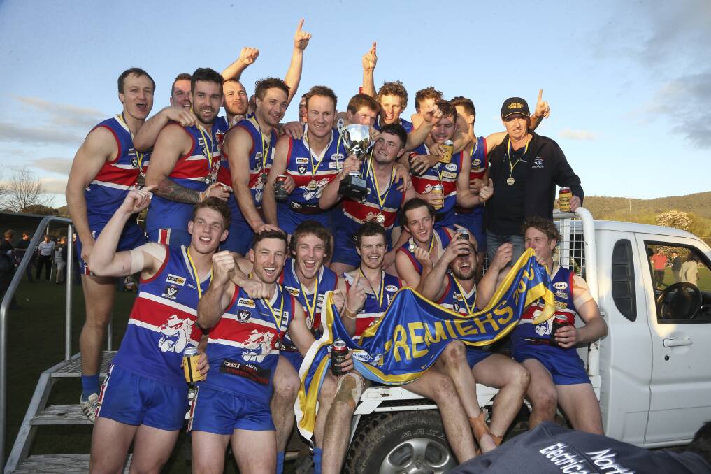 Thurgoona's players celebrate their 2016 grand final win.