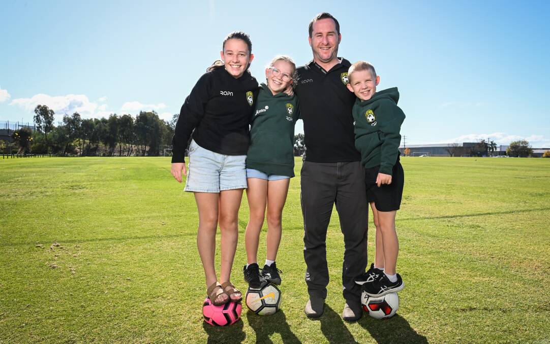 Andy Stevens is joined by kids Ava, Zoe and Levi at Alexandra Park, the scene of so many of his 400 senior games for St Pats over the last two decades. Picture by Mark Jesser