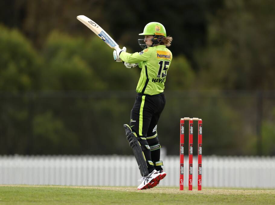 Rachael Haynes gets up on her toes for Sydney Thunder. Picture by Phil Hillyard