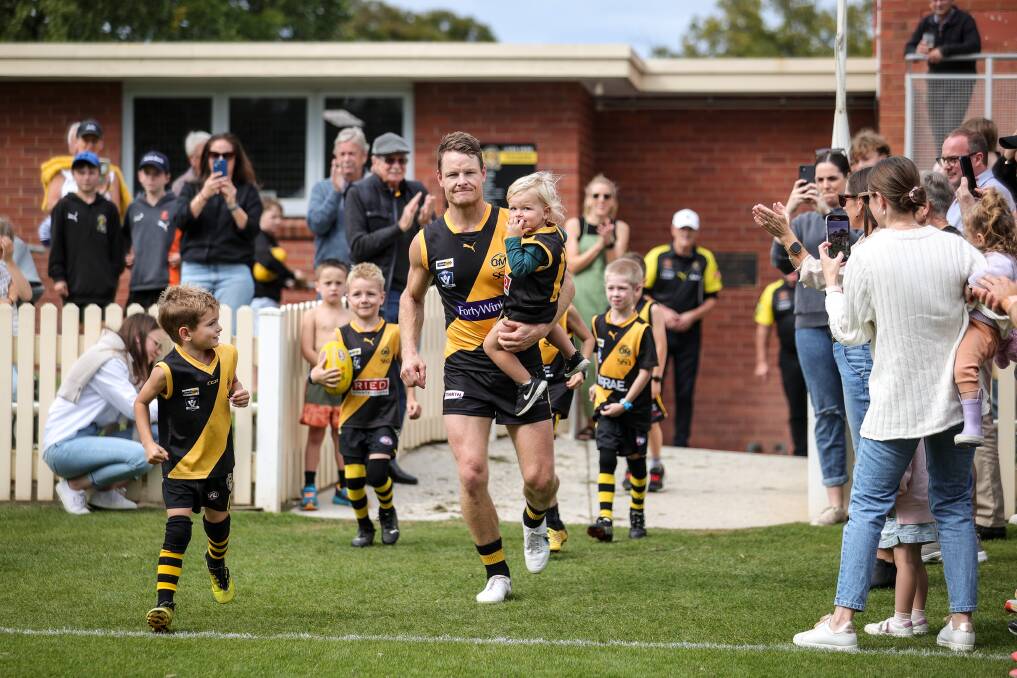 Luke Daly runs onto the ground for his 250th game for the Albury Tigers. Picture by James Wiltshire
