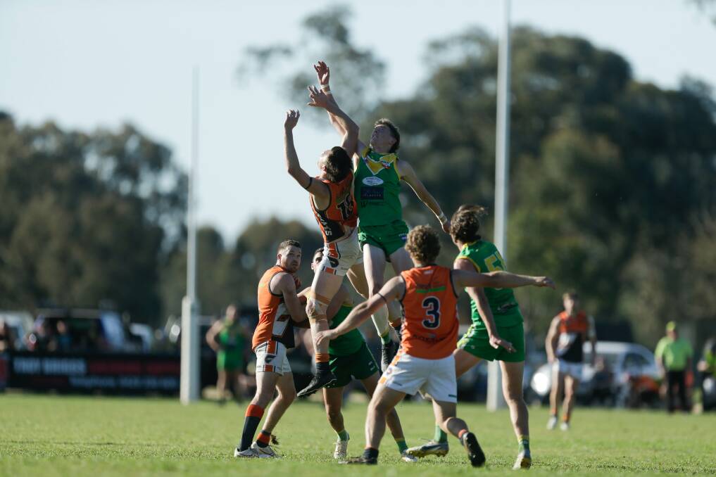 Holbrook's Jayden Hucker gets up highest in the ruck. Picture by Tara Trewhella