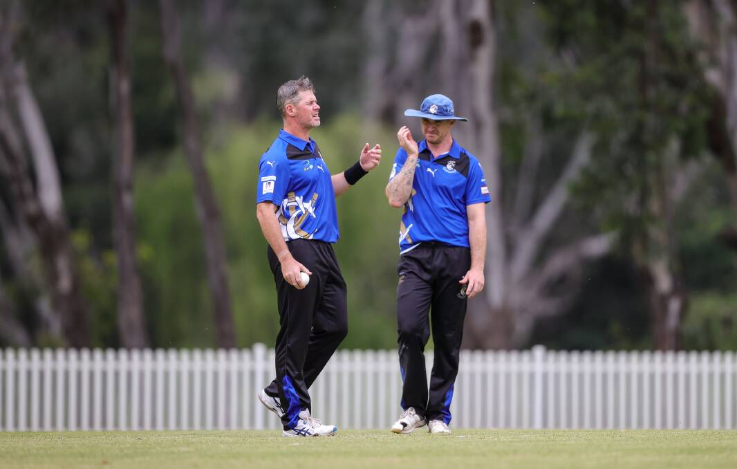 Dan Christian in discussion with Corowa captain Jarryd Hatton. Picture by James Wiltshire