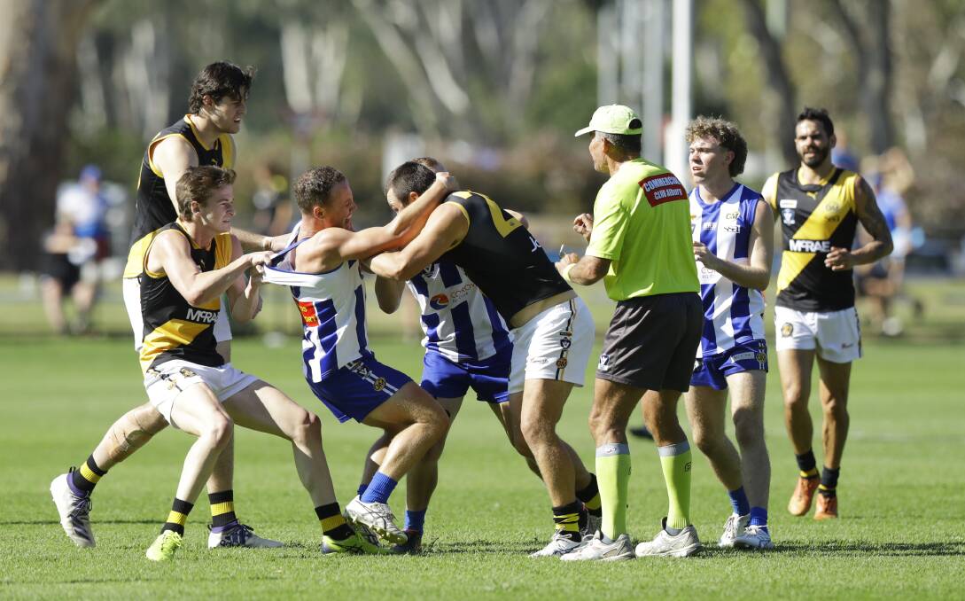 Tempers flare as both sides battle for control. Picture: ASH SMITH