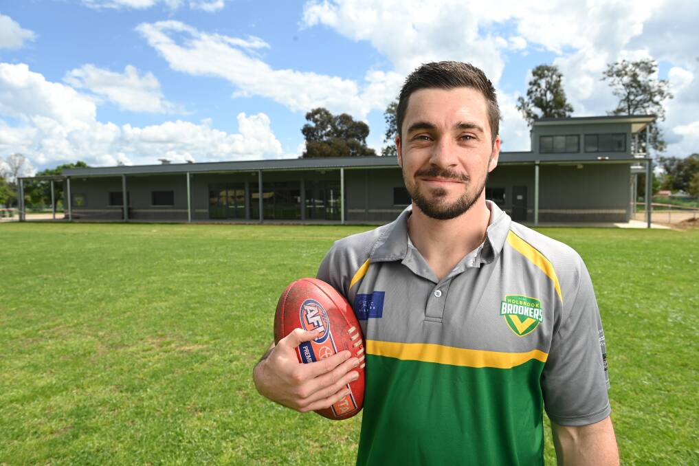 Josh Jones in front of Holbrook's new clubrooms. Picture by Mark Jesser
