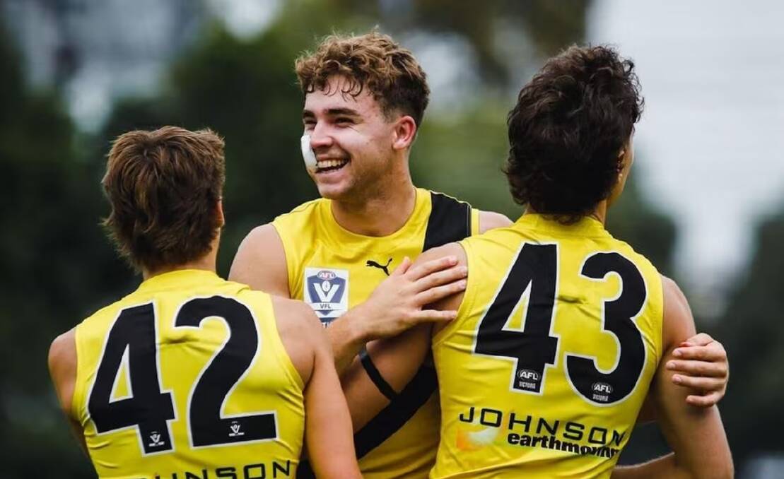 Kaelan Bradtke is all smiles as he celebrates one of his five goals on debut for Richmond's VFL side against the Northern Bullants at the Swinburne Centre.