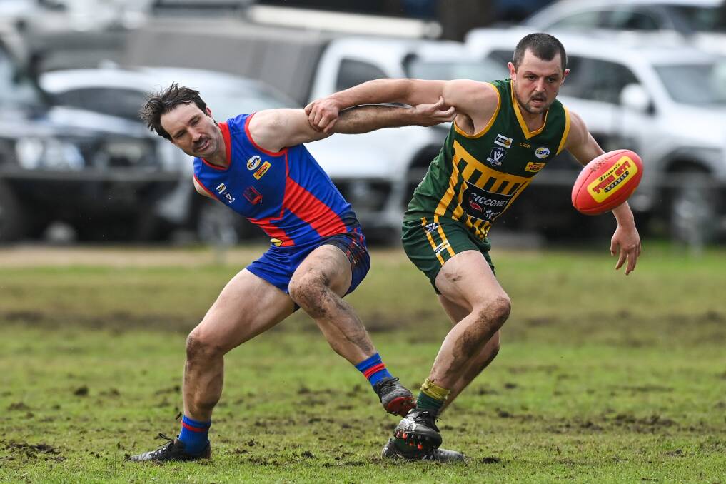 Beechworth's Dylan Pritchard and Tallangatta's Cameron Sheather battle it out at Rowen Park. Picture by Mark Jesser