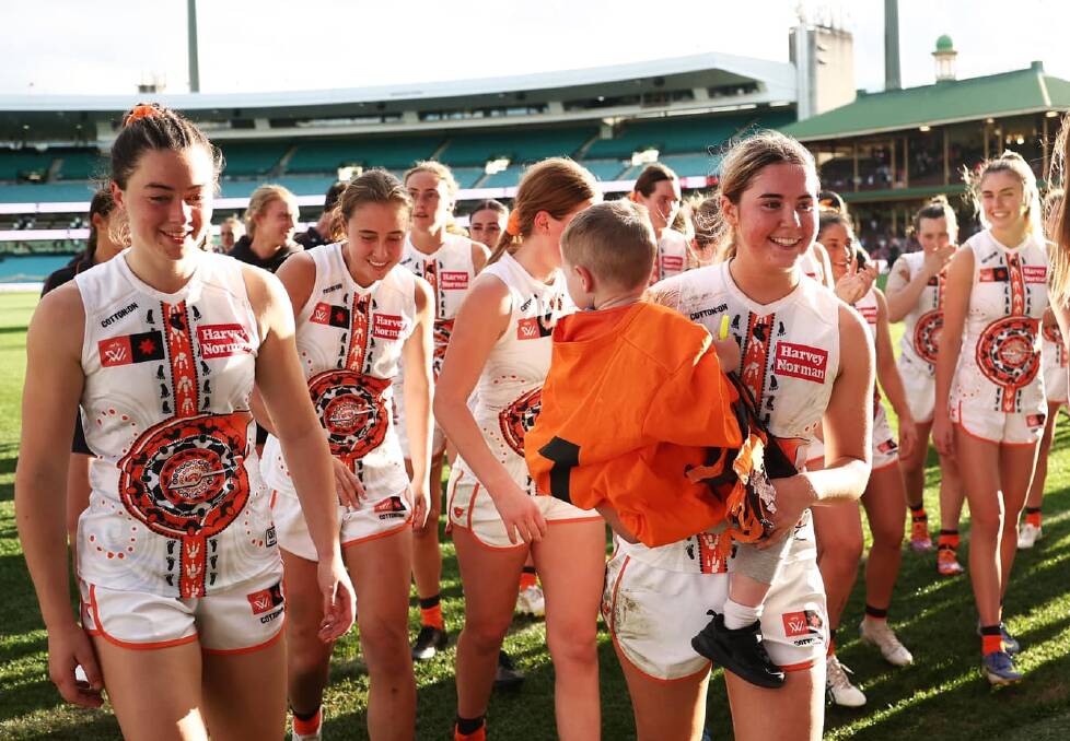 Zarlie Goldsworthy is all smiles as she walks off the Sydney Cricket Ground at the end of her AFLW debut on Saturday. Picture by GWS Giants
