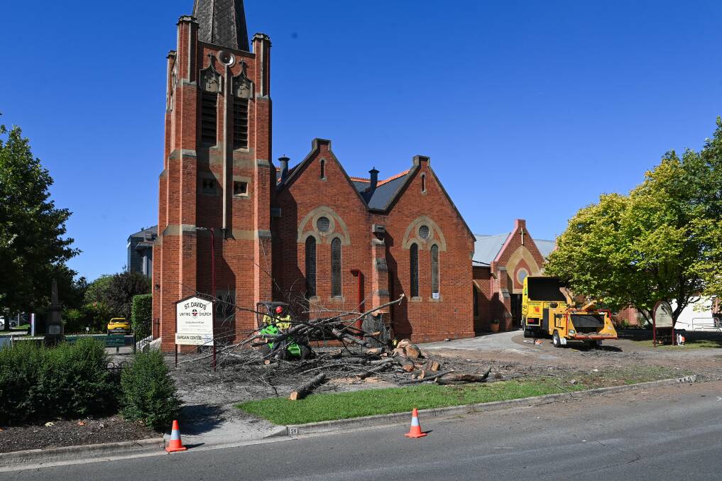 Uniting Church treasurer Lance Boswell said the tree, also known as a deodar, was "a standout piece of botany" and provided much shade and shelter. "It's a sad day for the church with such a landmark tree gone". Picture by Mark Jesser