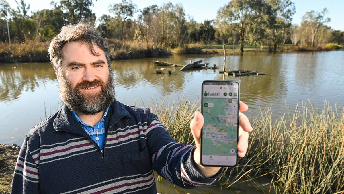 Associate professor Van Dyke is one of 55 entries to have been shortlisted for 18 Australian Museum Eureka Prizes, he shows the TurtleSAT app, which will help locate and help identify turtles in the area. Picture by Mark Jesser.