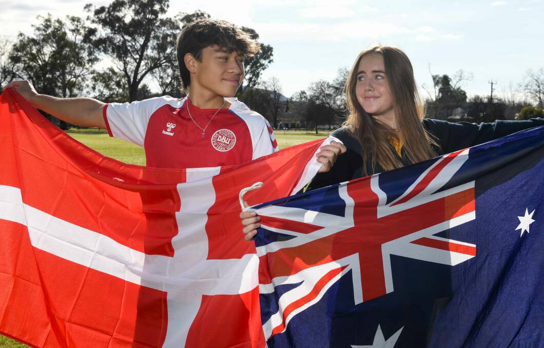 Danish exchange student Daniel Larsen, 15, and Albury's Ruby Kadaoui, 16, are looking forward to watching their respective countries compete in the women's World Cup soccer. Pictures by Tara Trewhella