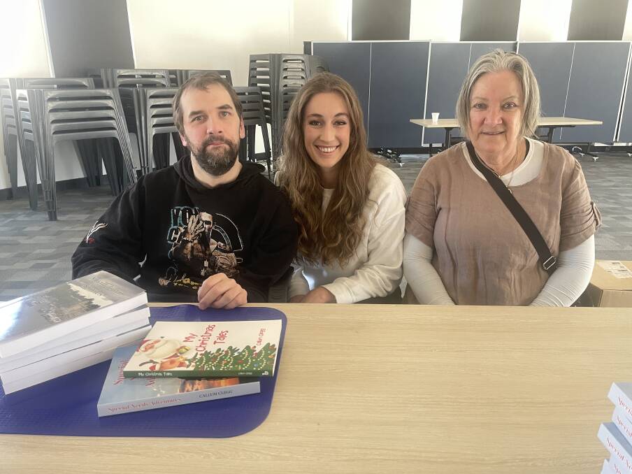 Author Callum Clegg, Sarah Lockwood and Jenny Coupe-Clegg at a book signing event at Beechworth Secondary College on Sunday, June 23. Picture supplied