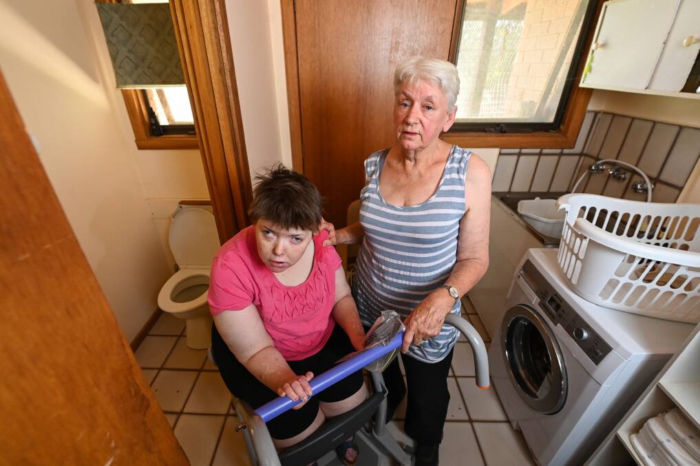 Kay Ruggi is unsure what to do next, but hopes people's generosity will allow her to care for daughter Melanie in a more accessible home. Picture by Mark Jesser
