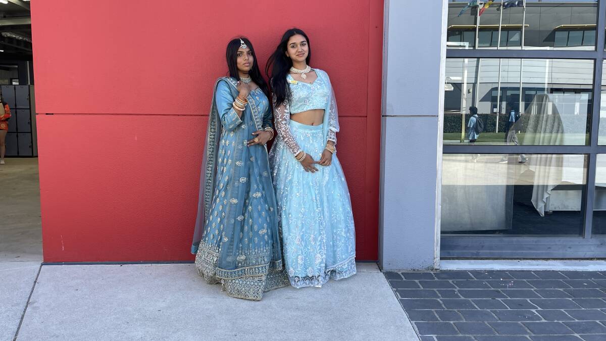 Indian student Kavya Patel, and Nepalese student Rashmi Budhathoki, 14, say it was great to dress in their cultural outfits and show them off in the schools fashion show. Picture by Sophie Else.