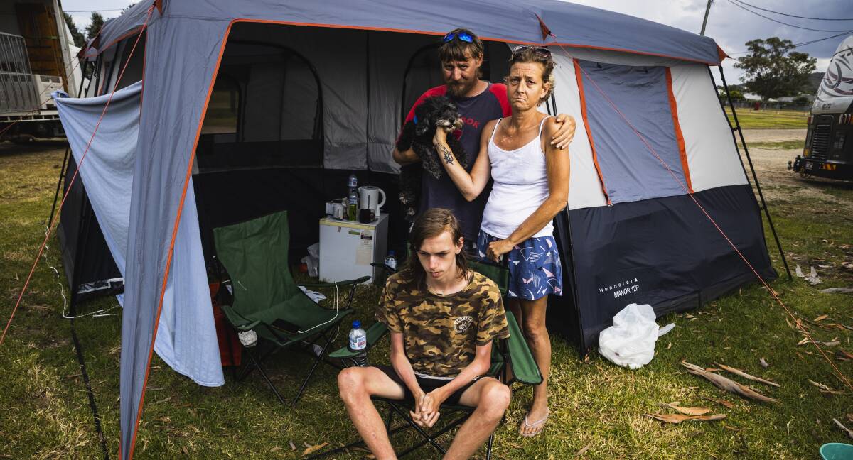 Homeless family Josh Morrison, Danielle Dixon and their son Jakob Morrison, with toy poodle Zak, have been living at Albury Showgrounds since last Friday but, along with other campers, have been asked to "move on" as preparations for New Year get under way. Picture by Ash Smith