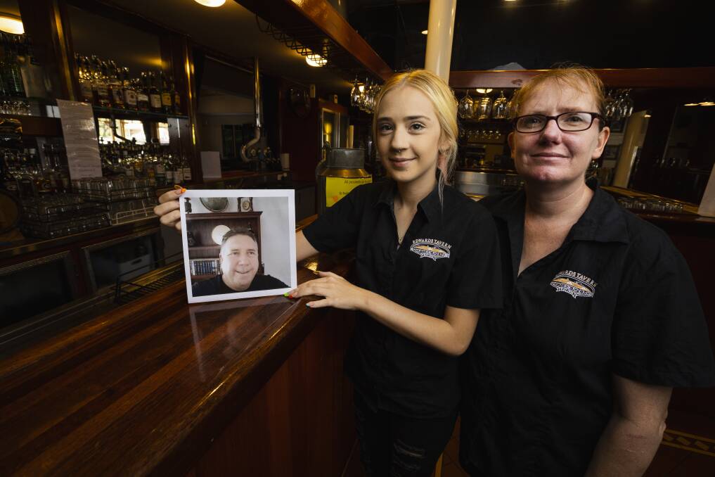 Maddi Waite and Tracy Boon with a picture of much-loved chef Bruce Edwards. Picture by Ash Smith
