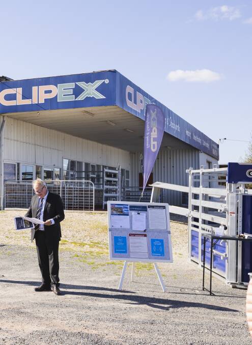 Auctioneer Andrew Dixon at the Clipex site on Wagga Road. It was passed in at $1 million but sold minutes later for an undisclosed sum. Picture by Ash Smith 