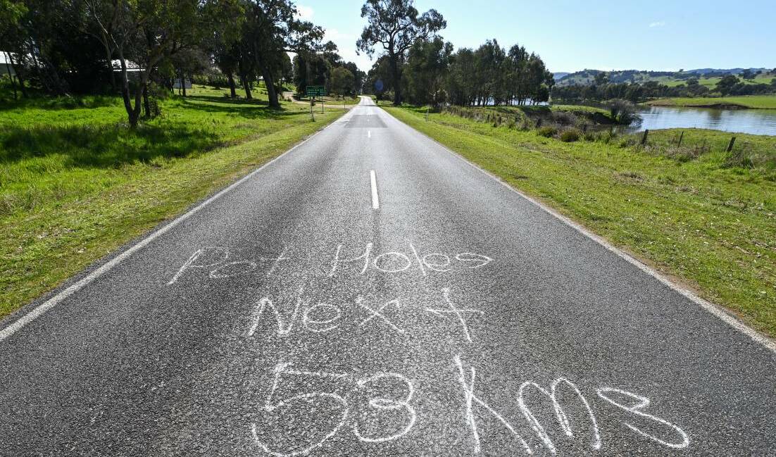 Bumpy ride ahead on the Murray River Road near Granya. Eskdale pensioner Bernard Butler is $3000 out of pocket after his car and trailer struck a massive pothole on Kiewa Valley Highway which has since been filled. Picture by Mark Jesser