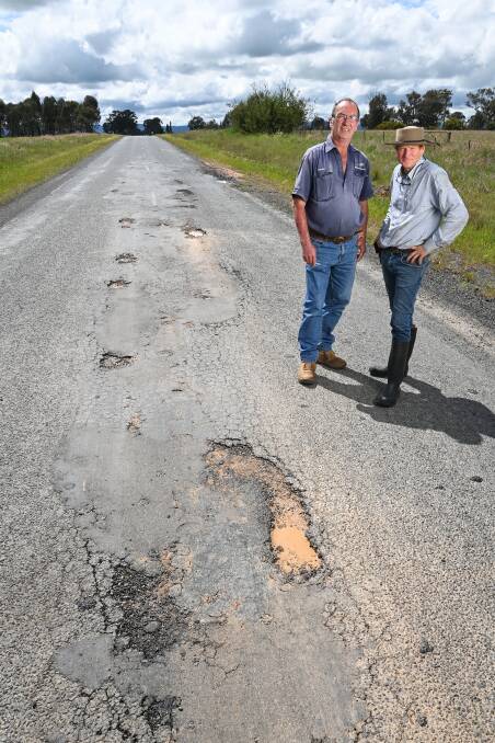 Last October Wantagong Valley residents Richard Harbison and Bruce Allworth campaigned to get the Holbrook-Jingellic Road repaired. Picture by Mark Jesser