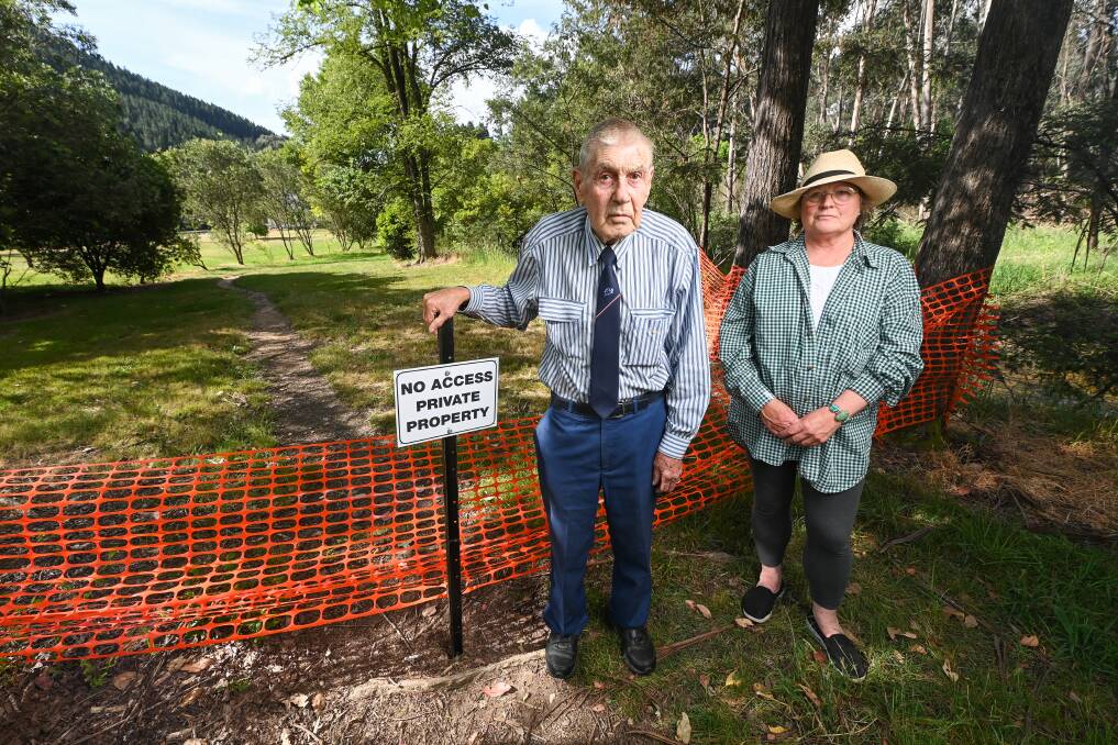 Bernard Eden and Kate Farrell at a part of the trail that has been blocked off with red webbing, not electric fencing. Picture by Mark Jesser