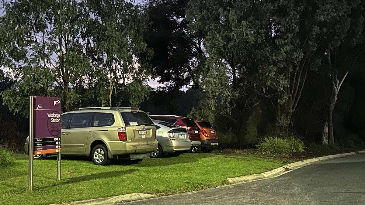 Cars are seen forced to park outside of the packed car park at Wodonga train station last Sunday while Essendon played Carlton in Melbourne. Picture by Mark Jesser