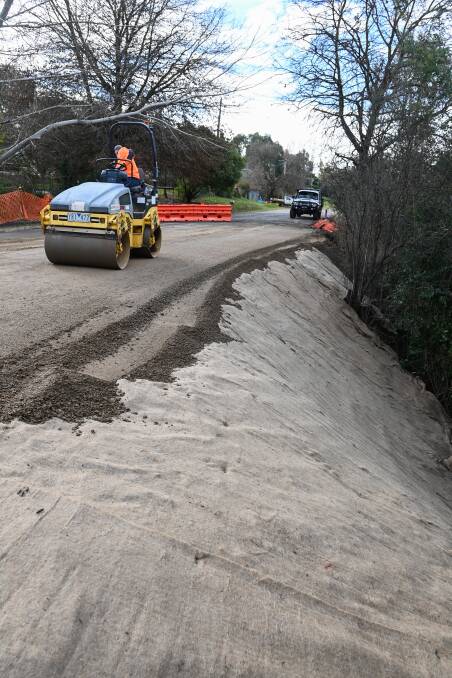 After: Repairs to the Bells Flat Road sinkhole pictured on Thursday are close to being finished. Picture by Mark Jesser
