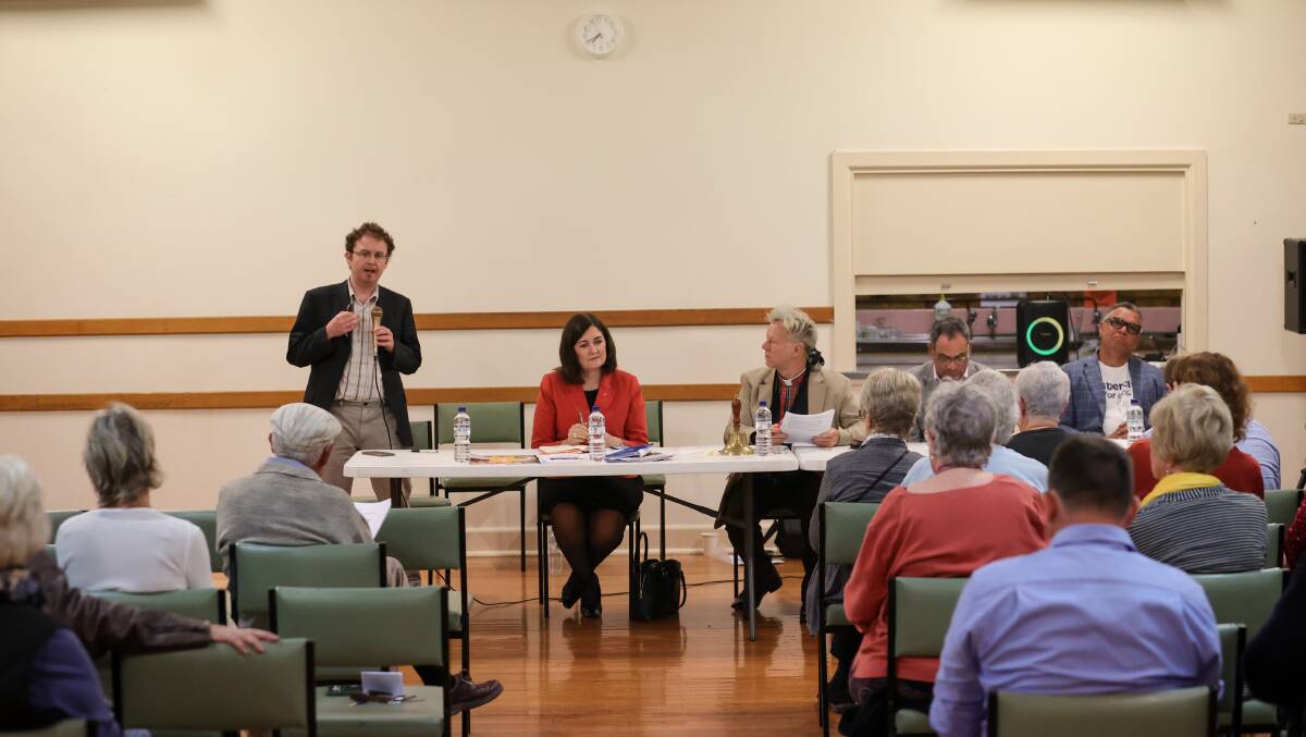 Damien Freeman, left, addresses the 40-strong crowd at Wangaratta's CWA Hall. Picture by James Wiltshire.