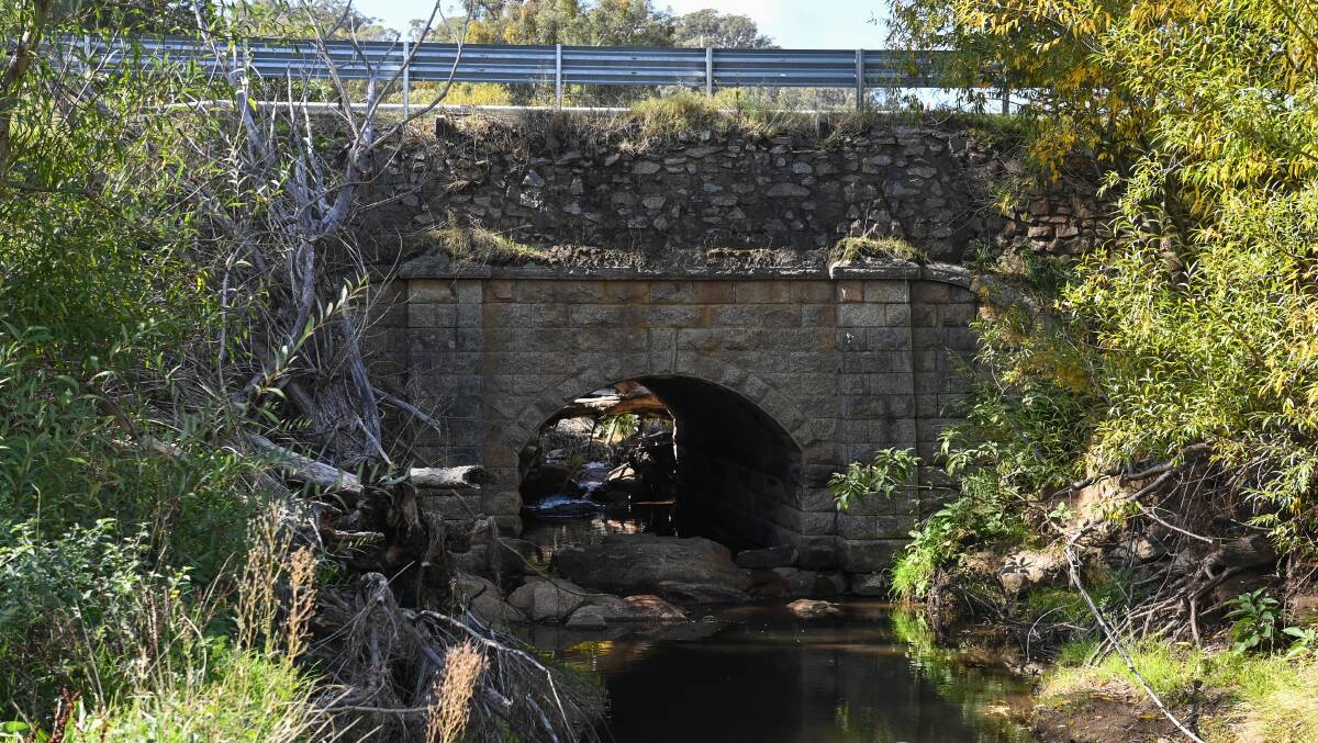 A damaged culvert at a bridge on Beechworth-Wodonga Road prompted Regional Roads Victoria to close the road in April. Indigo Shire Council is still lobbying the state to repair the damage and reopen the road. Picture by Mark Jesser