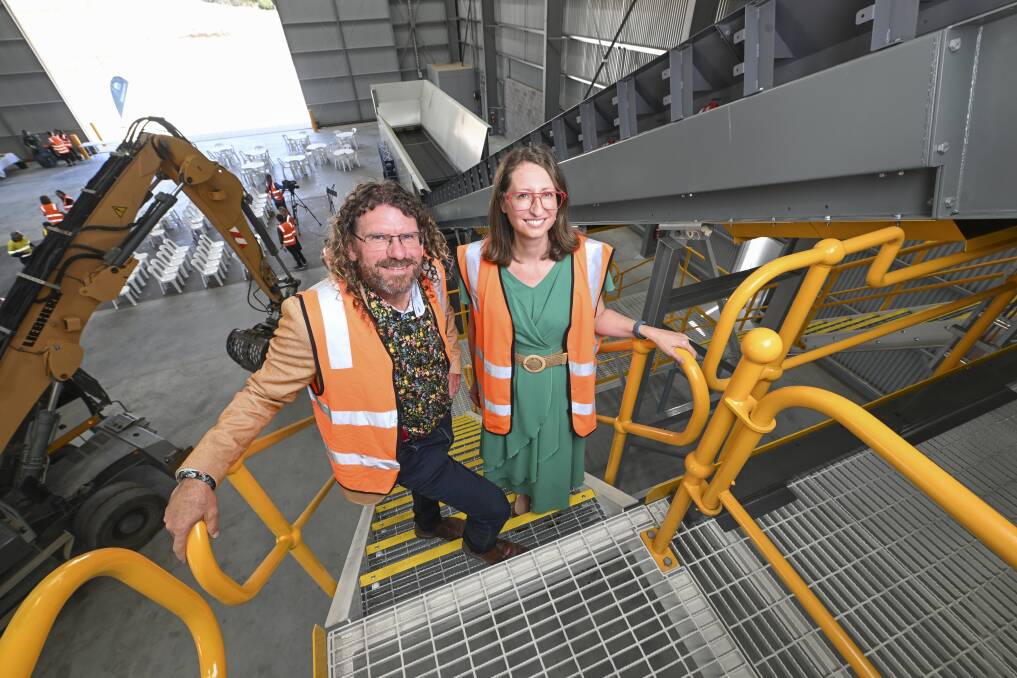  Deputy mayor Steve Bowen and EPA executive director Alex Geddes at the top of the conveyer belt that is expected to make a big impact on reducing the city's construction and demolition waste. Picture by Mark Jesser