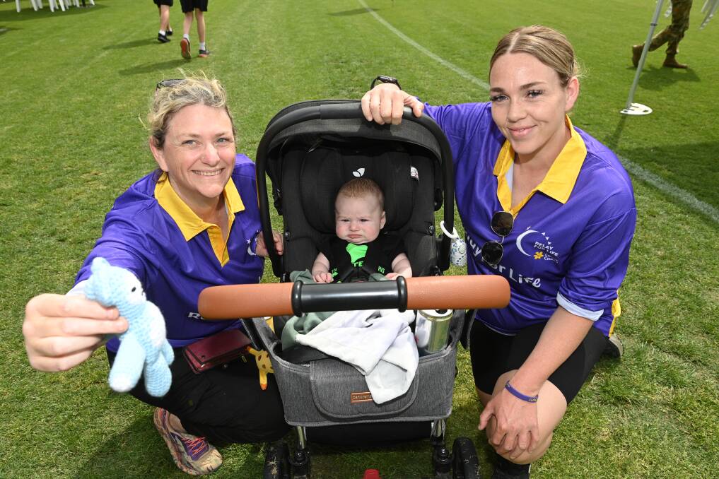 Kylie Smith, Leo Williams, 13 weeks, and Stephanie Gill from Albury at Relay for Life. Picture by Mark Jesser