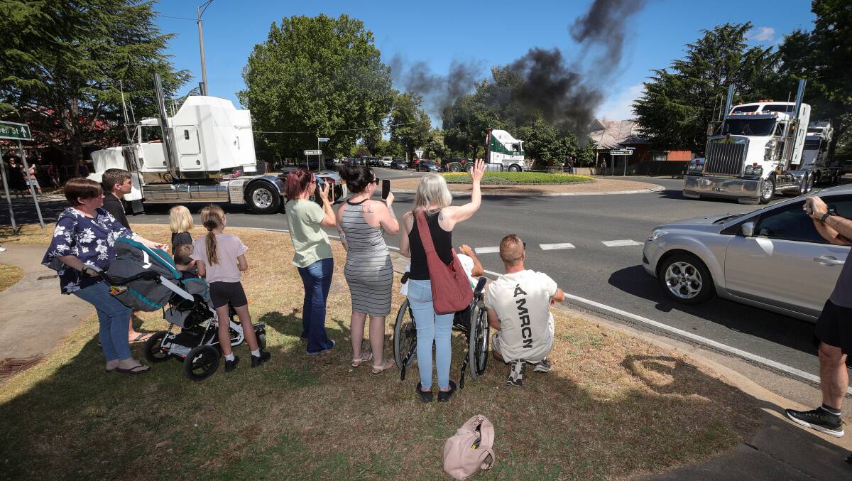 Cancer patient Richard Slee with his family greet 50 truckies rolling through Wangaratta on Saturday morning. Picture by James Wiltshire