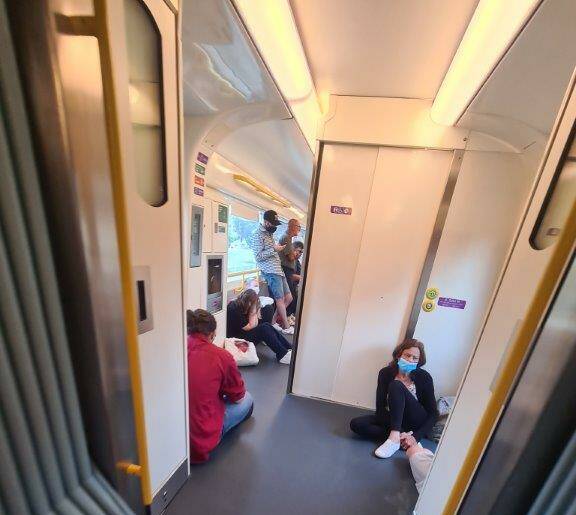 Forty people were forced to either sit on the floor or stand in the three-carriage train because no bus service was offered.