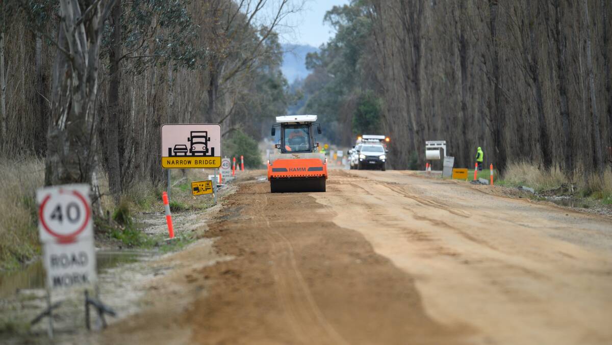 Greater Hume Council workers widen Jingellic Road at Wantagong as part of several partly state-funded works. Mayor Tony Quinn said widening the bridges was the next step to make passage on the road safe. Picture by Mark Jesser