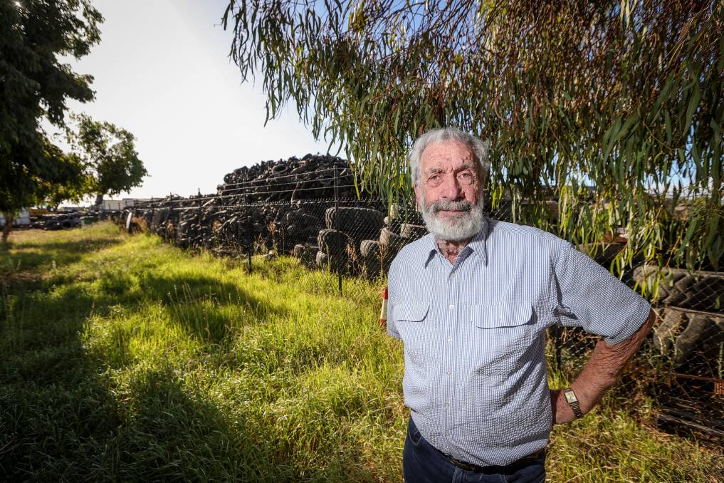 Thurgoona resident John Haydon is concerned that smoke from a stockpile of tyres near the Albury airfield could force the airport to close of there was a fire. Picture by James Wiltshire.