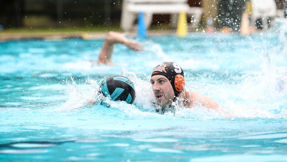 Tigers' Tom Duck gets on the move. Picture by James Wiltshire