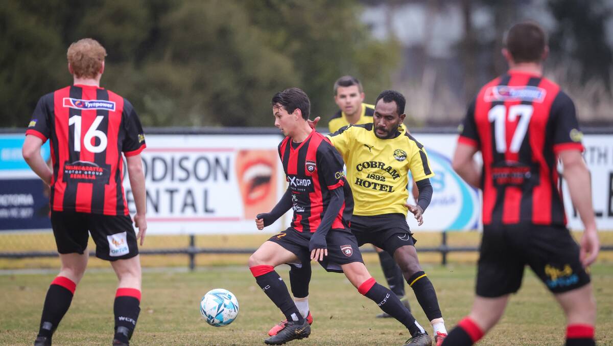 Lyster on the ball against Cobram during the 2022 season. Picture by James Wiltshire