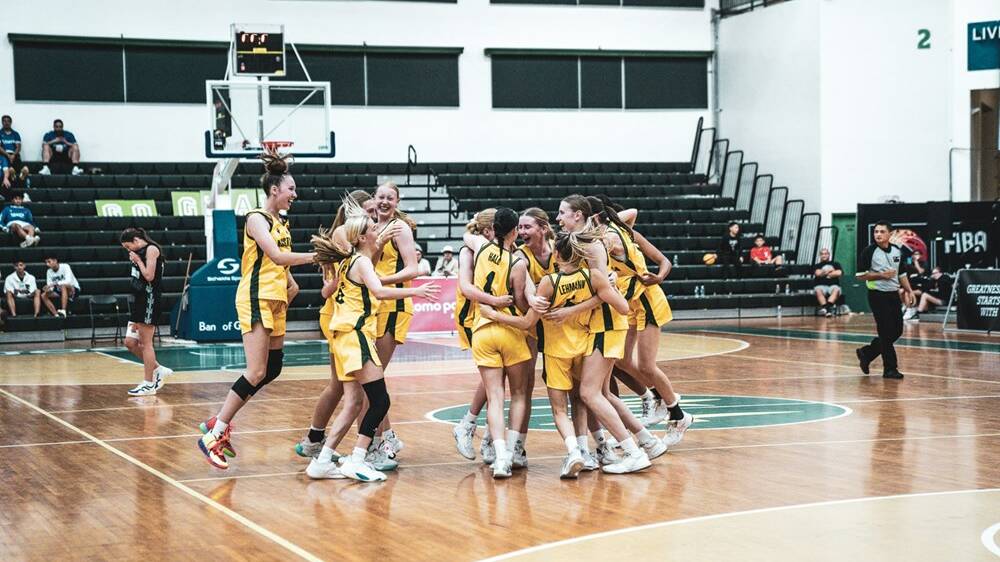 Jade Crook celebrating the win with her Sapphires teammates. Picture by FIBA