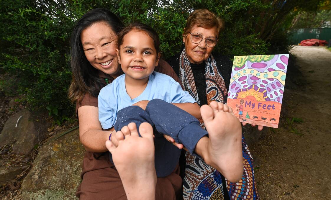 Border writer Aimee Chan, preschool student Estelle Duncan and Aunty Edna Stewart celebrate the release of the book, My Feet. Picture by Mark Jesser