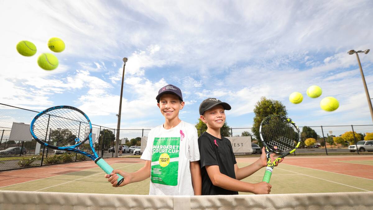 Hugh Bergin and his brother Will (9), pictured at Wodonga Tennis Centre. Picture by James Wiltshire