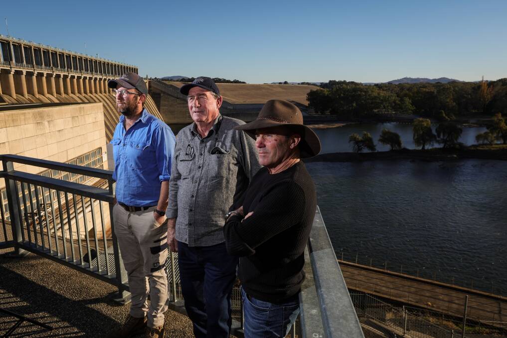 Lake Hume residents Tom Webb, Tom Doolan and Murray Pigdon are among a group of residents who stand in opposition to a proposed lithium battery site in the area. Picture by James Wiltshire