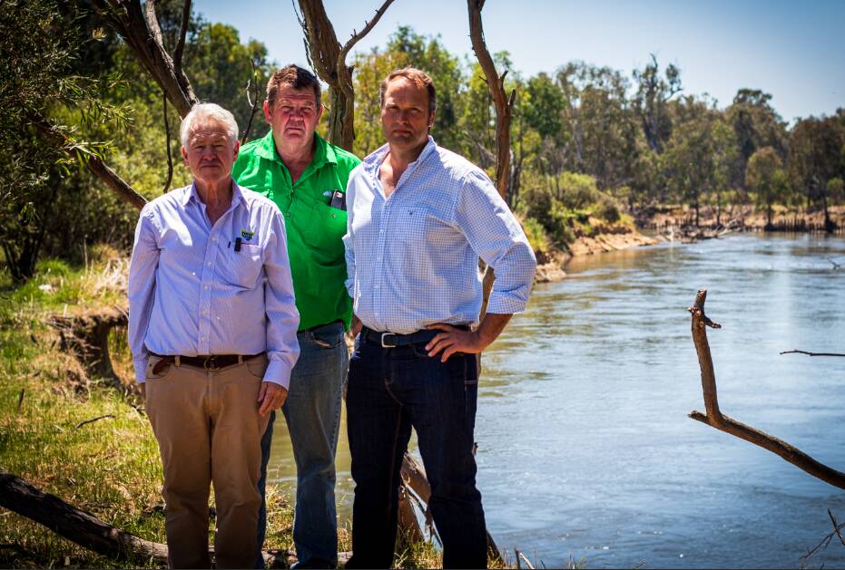 NSW Farmers' president Xavier Martin, National Farmers' Federation water chairman Malcolm Holm and National Farmers' Federation president David Jochinke visited a Bungowannah farm to witness first hand the impact of excess water on bank erosion. Picture by Layton Holley