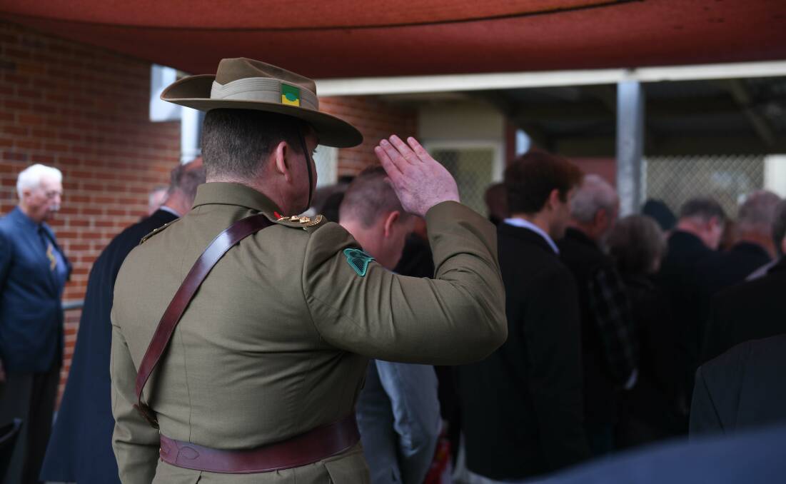 A veteran paying his respect at the commemorative service. Picture by Tara Trewhella