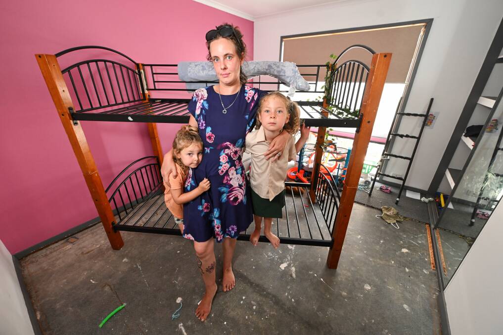 Tara McDonald's home and all its contents has been destroyed after a tsunami of sewage swamped the house on Sunday morning - Tara McDonald with her daughters May, 5, and Leerah, 4. Picture by Mark Jesser