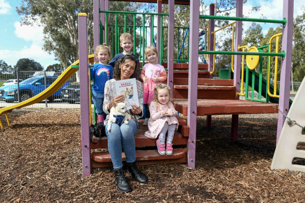 Jennifer Bryden-Brown with her dog Pablo and playgroup children Lexi Oldfield, Liam Parkin, Millie Parkin and Billie Gibbons. Picture by Tara Trewhella