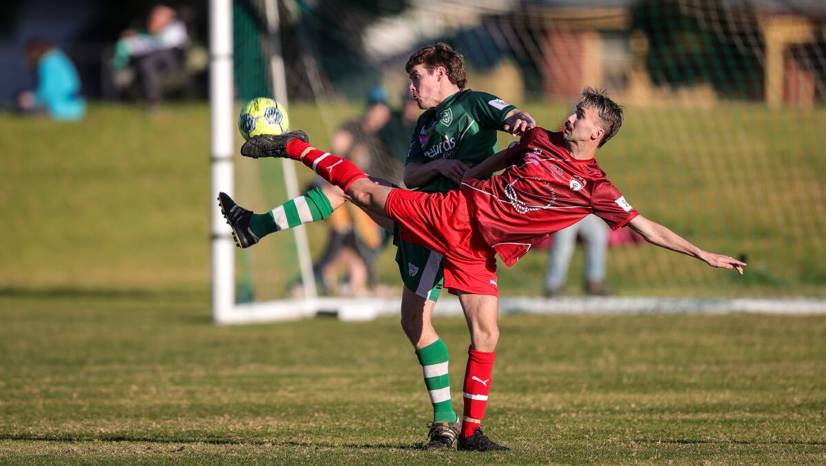 Wodonga Diamond Noah Spiteri and Albury United's Sam Brosolo vie for the ball at Jelbart Park. Pictures by James Wiltshire