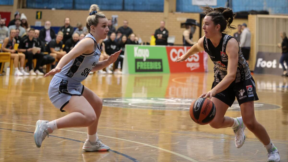 Youngster Liz Murphy, who scored 16 points, goes head-to-head with her Sutherland opponent.
